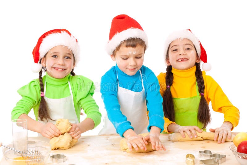 Three Smiling Kids with Christmas Cooking Stock Photo - Image of pastry