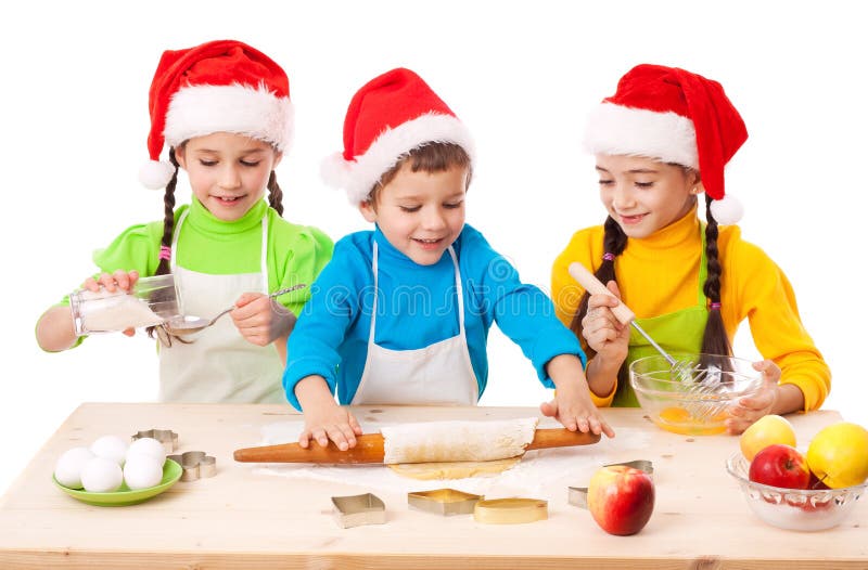 Three Smiling Kids with Christmas Cooking Stock Image - Image of bakery