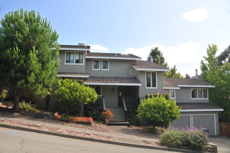 Three story house on sloped hill