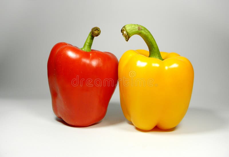 Three Sweet Peppers (red, Green, Yellow) Isolated on White Background