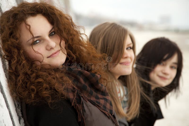 Three teen girlfriends at outdoor