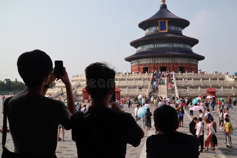Three Tourist Spectator Visiting Temple of Heaven Beijing