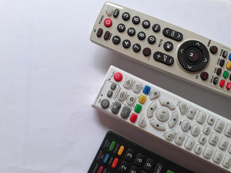 Three Tv Remotes on White Background Stock Image Image of watching