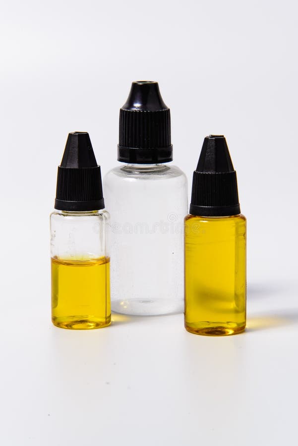 Three vape juice bottles stock photo. Image of removed 53843564