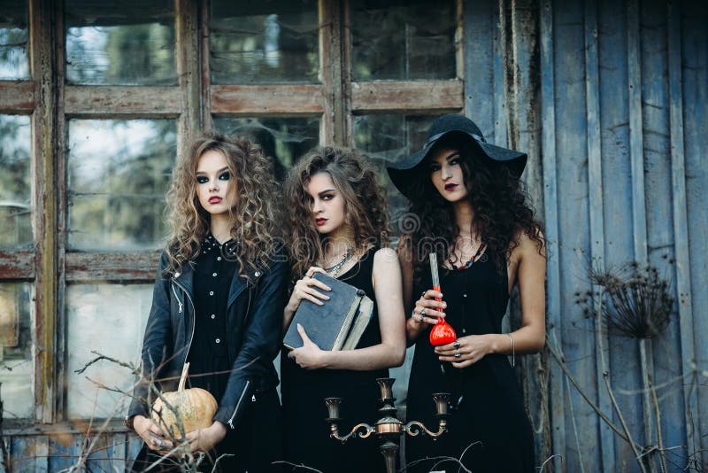 Three vintage women as witches royalty free stock photo Three vintage women as witches royalty free stock photo