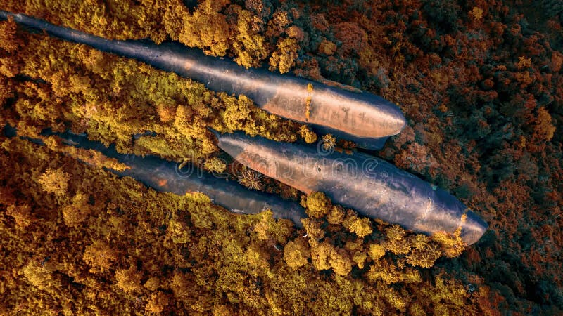 Three whale stones is Popular natural attractions in Thailand. Bird eye view shot of three whales rock in Phu Sing Country park in Bungkarn, Thailand. In the autumn.