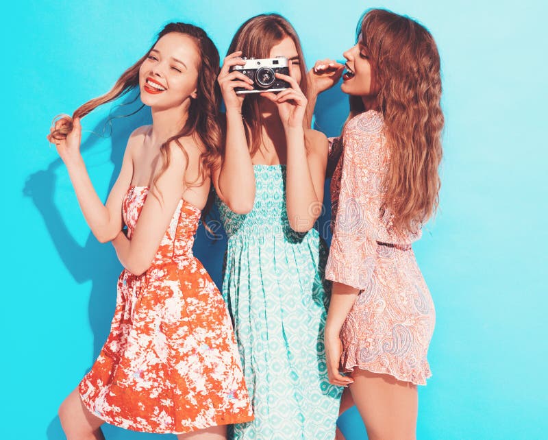 Three Young Beautiful Hipster Girls In Trendy Clothes In Studio Stock ...