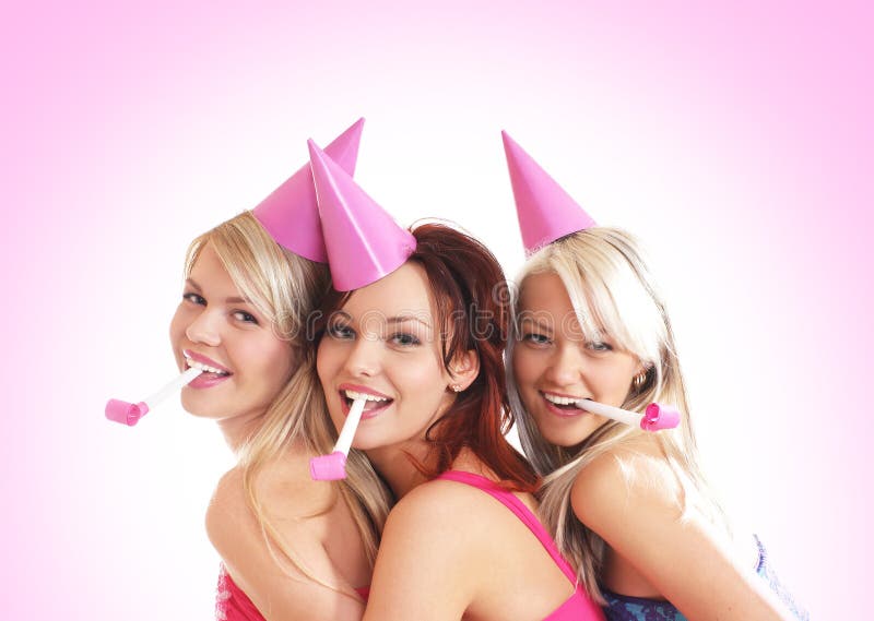 Three young girls are having a birthday party