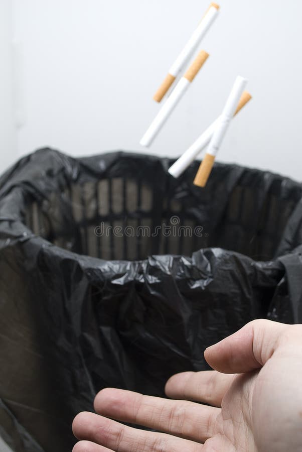 Throwing Cigarettes in a Bin Stock Photo Image of cigarette, health