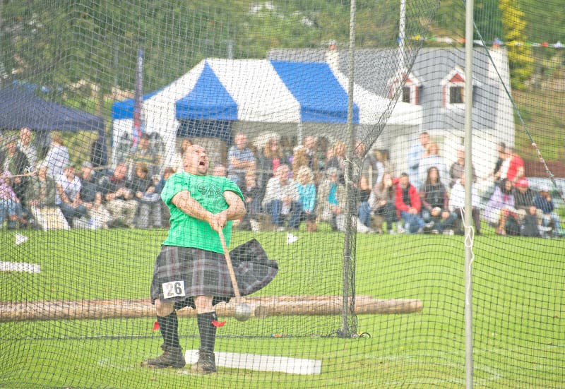 Swinging the Hammer at Nairn. Editorial Stock Photo Image of exciting
