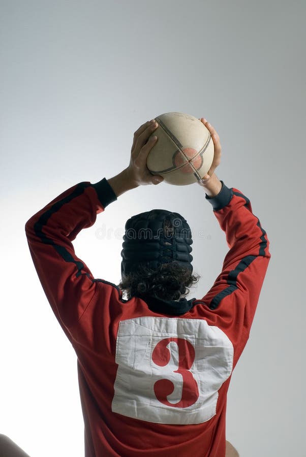 Throwing Rugby Ball - vertical