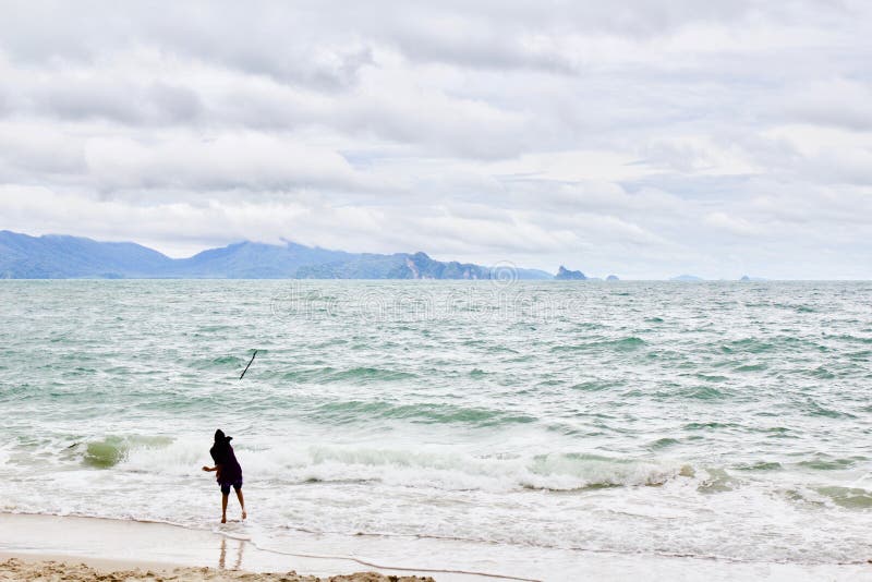 Throwing a Stick into Oceanic View of Langkawi in Malaysia Stock Image Image of holiday