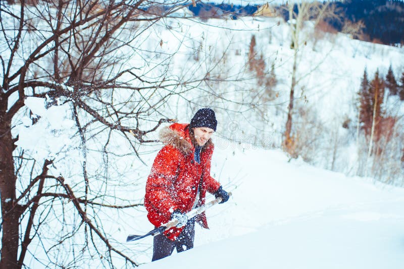 Throws snow shovel stock photo