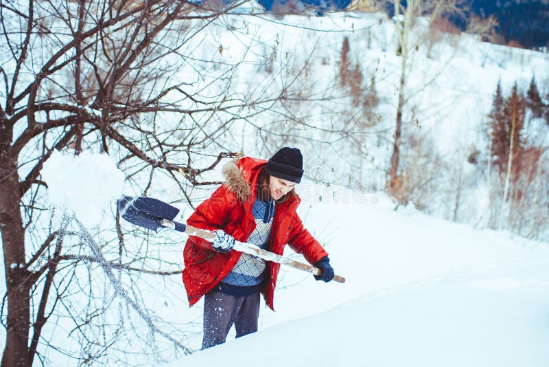 Throws snow shovel stock images