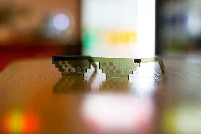 Thug life Glasses on the desk,llife style,black glasses,gangster style, rap style stock photos Thug life Glasses on the desk,llife style,black glasses,gangster style, rap style stock photos