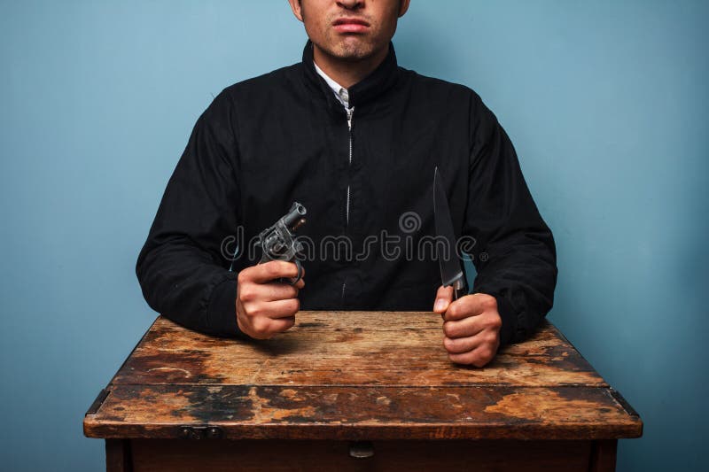 Young thug with a gun stock image. Image of background 24394969