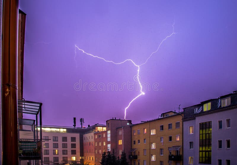 Thunderstorm in the night: Lightning on the sky, urban city, Austria.