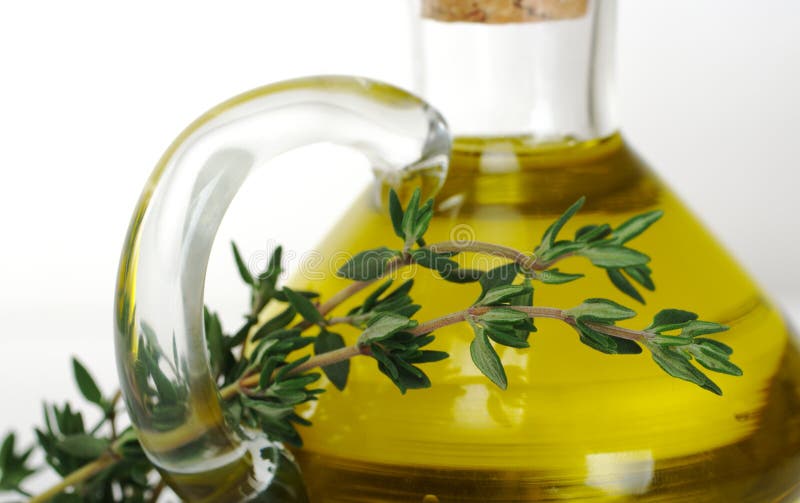 Thyme with Olive Oil stock image. Image of glass, green 15175919