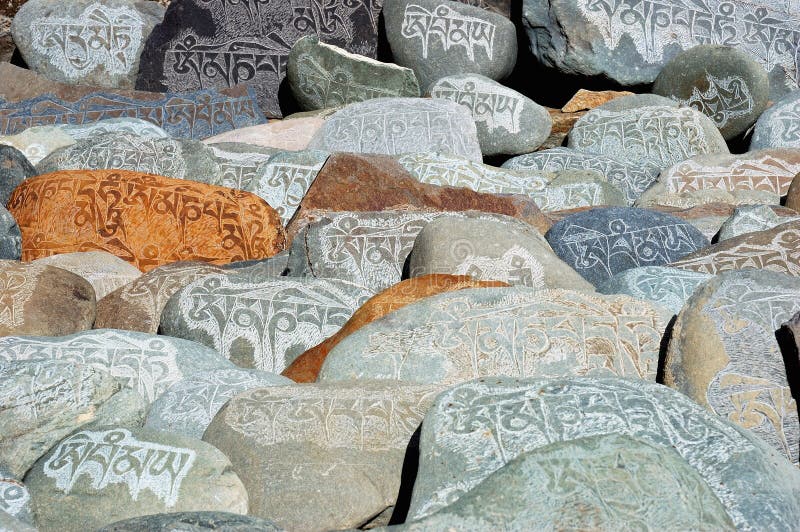 Tibetan prayer stones stock images