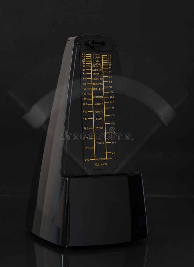 Metronome Ticking and Reflected on Piano Stock Photo Image of piano