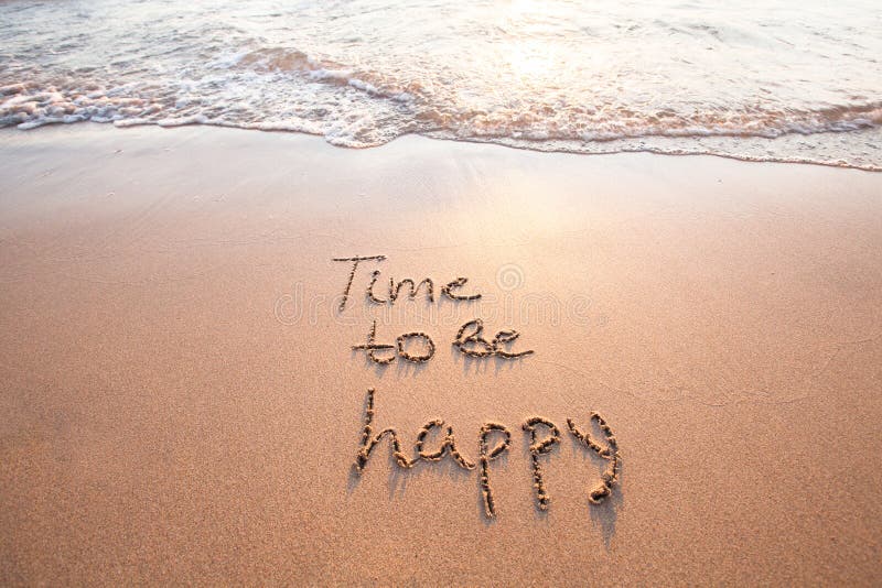 Time to be happy, happiness concept written on the sand. Time to be happy, happiness concept written on the sand