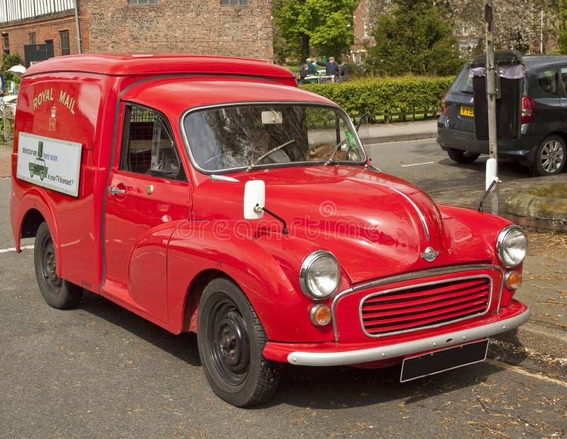 A recently restored , early Royal Mail delivery van. Make Morris Minor. Classic car rally, Gainsborough Old Hall, Lincolnshire, UK. A recently restored , early Royal Mail delivery van. Make Morris Minor. Classic car rally, Gainsborough Old Hall, Lincolnshire, UK.