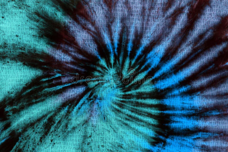 Tie dyed pattern on cotton fabric for background. Tie dyed pattern hand dye on cotton fabric abstract background stock photo Tie dyed pattern on cotton fabric for background. Tie dyed pattern hand dye on cotton fabric abstract background stock photo