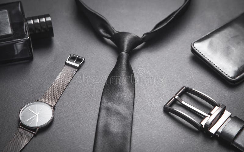 Tie, Belt, Wristwatch and Perfume on the Black Background. Men ...