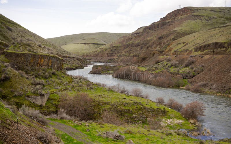 The Deschutes River cuts a path thru rock and earth heading out to the Columbia River. The Deschutes River cuts a path thru rock and earth heading out to the Columbia River