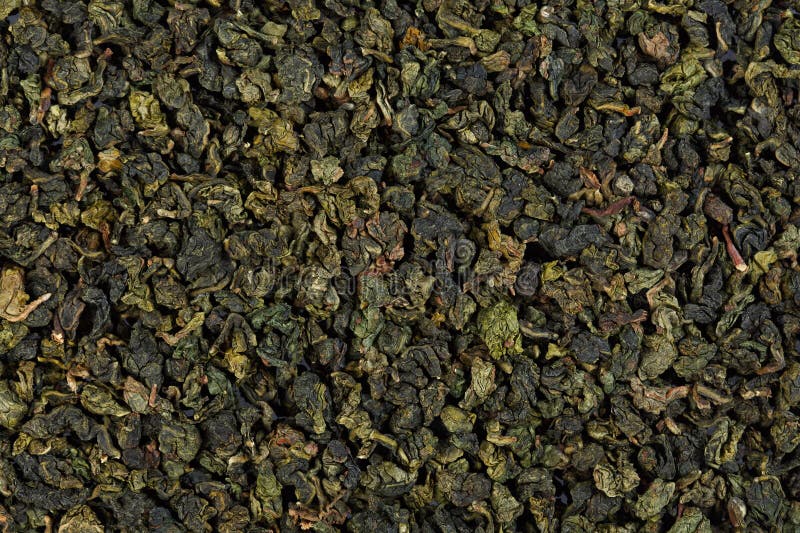 Tieguanyin teblad, Chineese Oolong te textur royaltyfri bild Tieguanyin teblad, Chineese Oolong te textur royaltyfri bild