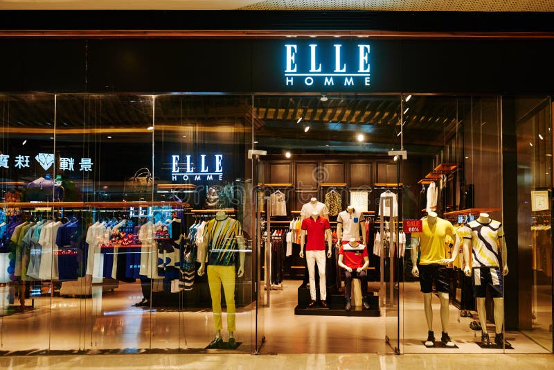 Tienda De La Moda De Los Hombres Del Homme De Elle Imagen de archivo  editorial - Imagen de porcelana, ropas: 59098274