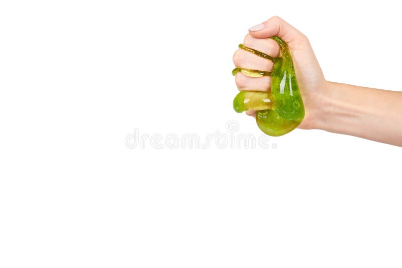 tiener die groen slijm met hand, transparant stuk speelgoed spelen stock afbeelding tiener die groen slijm met hand, transparant stuk speelgoed spelen stock afbeelding