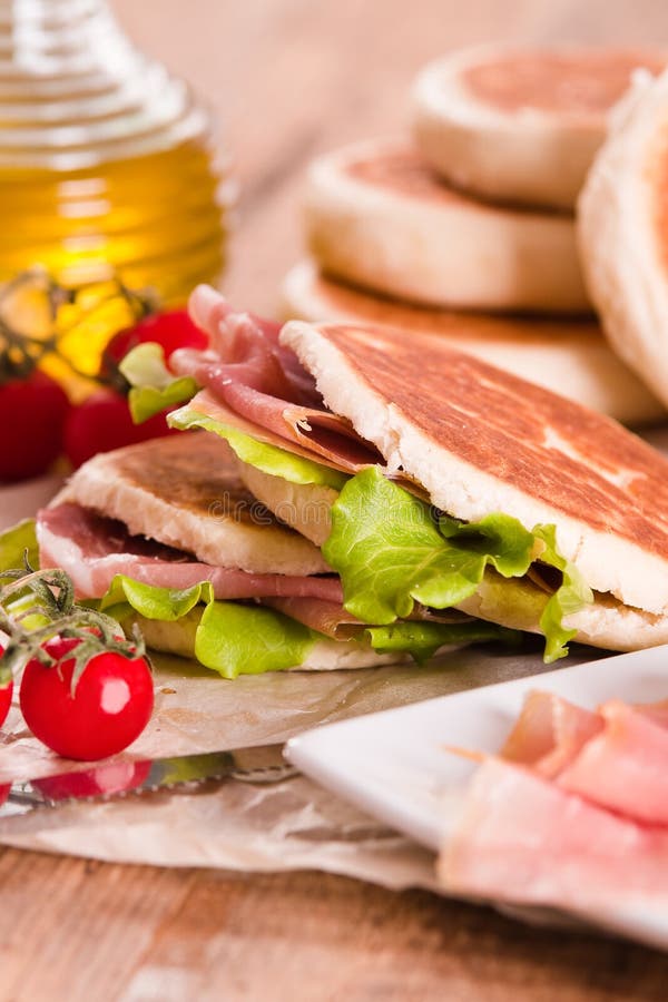 Tigella Bread Stuffed with Ham and Lettuce. Stock Photo - Image of ...
