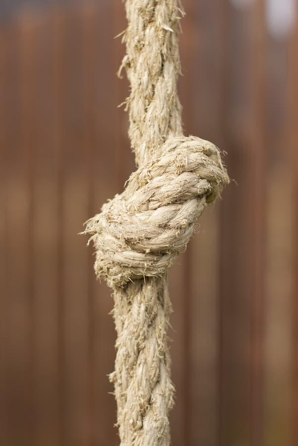 Tight knot on the rope. stock image. Image of object 12574341