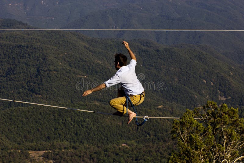 Tightrope walker editorial photography. Image of risk 26216307