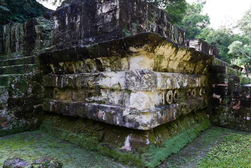 Ancient Mayan ruins in Tikal Guatemala half covered and underground. Ancient Mayan ruins in Tikal Guatemala half covered and underground