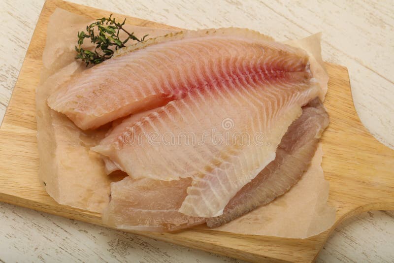 TIlapia filet stock afbeelding. Image of nave, peper 112882363
