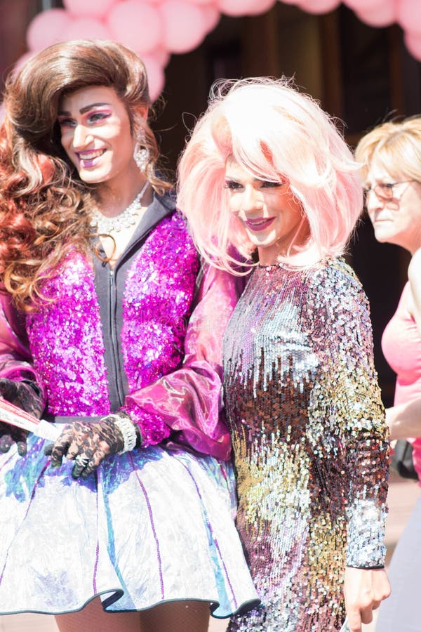 Tilburg, Netherlands - 22.07.2019: couple of transgender man in spectacular costumes at Roze Mandaag pink monday - gay, lgbt pride day in Netherlands. Tilburg, Netherlands - 22.07.2019: couple of transgender man in spectacular costumes at Roze Mandaag pink monday - gay, lgbt pride day in Netherlands