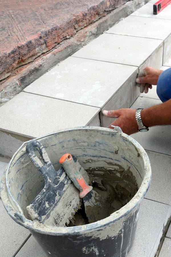 Tile laying stock image. Image of pattern, male, architecture 27374691