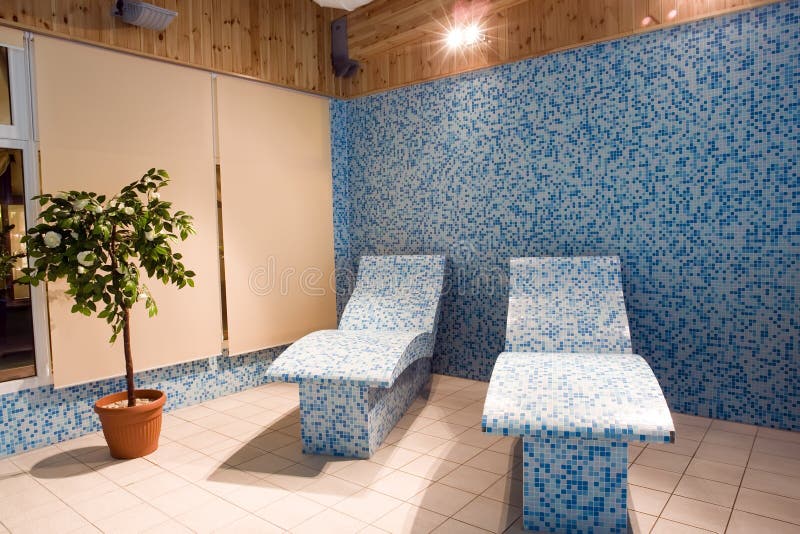 Tiled couches in spa stock photo. Image of recline, interior 8014554
