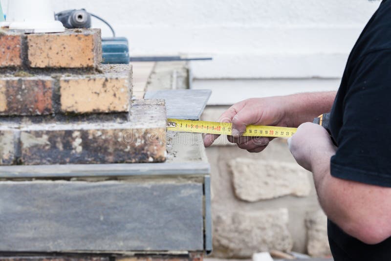 Man Marks the Tile Tile with a Pencil Stock Photo Image of measure