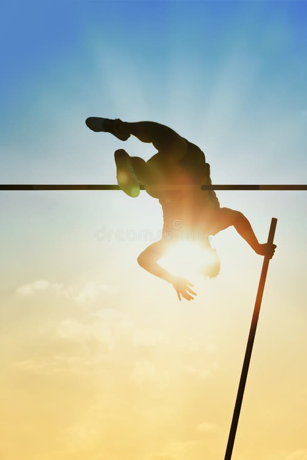 Pole vault over the bar with back light. Pole vault over the bar with back light