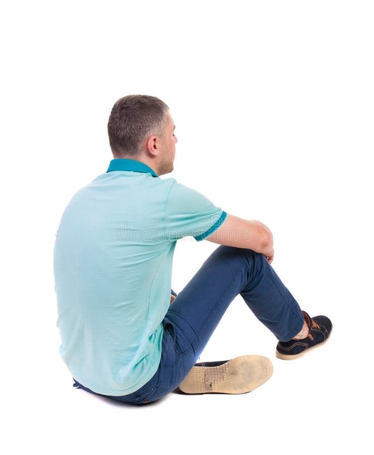 Back view of seated handsome man in polo looking up. Standing young guy in jeans. Rear view people collection. backside view of person. Isolated over white background. Guy in a T-shirt sits wearily leaning on leg. Back view of seated handsome man in polo looking up. Standing young guy in jeans. Rear view people collection. backside view of person. Isolated over white background. Guy in a T-shirt sits wearily leaning on leg