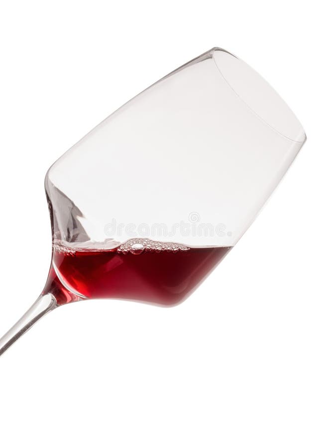 Tilted red wine glass – License image – 11248000 ❘ Image Professionals