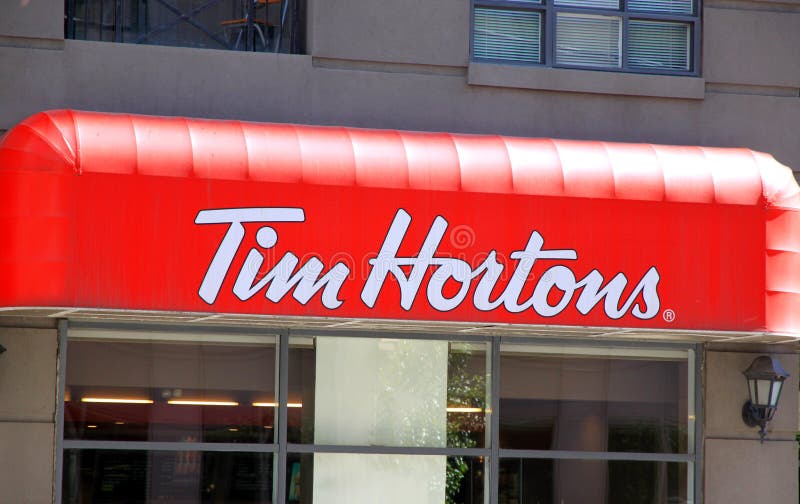 MONTREAL, CANADA - NOVEMBER 9, 2018: Tim Hortons logo in front of one of  their restaurants in Montreal, Quebec. Tim Hortons is a cafe and fastfood  can Stock Photo - Alamy