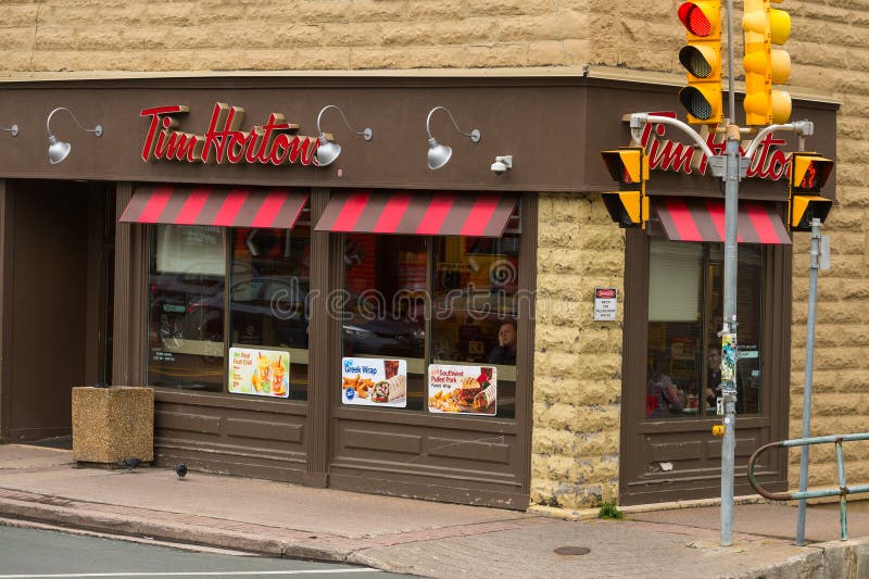 MONTREAL, CANADA - NOVEMBER 9, 2018: Tim Hortons logo in front of one of  their restaurants in Montreal, Quebec. Tim Hortons is a cafe and fastfood  can Stock Photo - Alamy