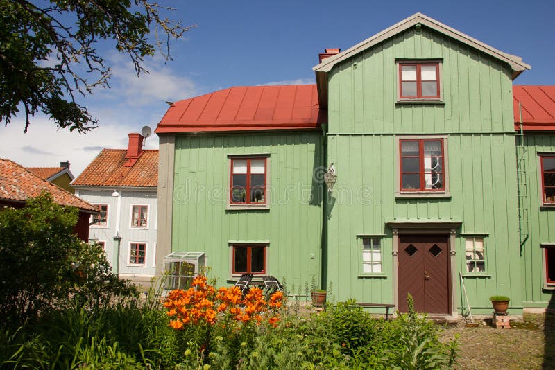 Timber green house and back garden. Vadstena. Sweden