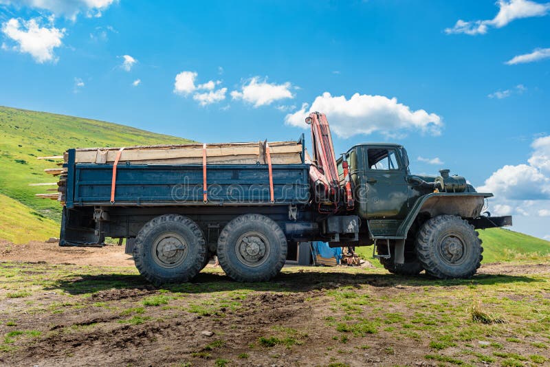 timber-truck-carpathians-ivano-frankovsk-ukraine-july-loaded-old-ural-transporting-logs-176515410.jpg