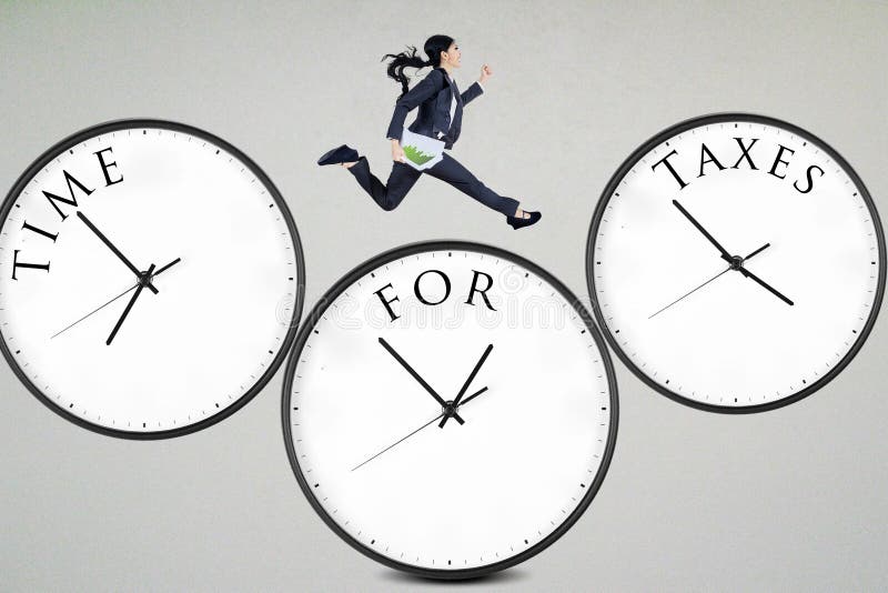 Businesswoman running over the clocks with time for taxes. Businesswoman running over the clocks with time for taxes