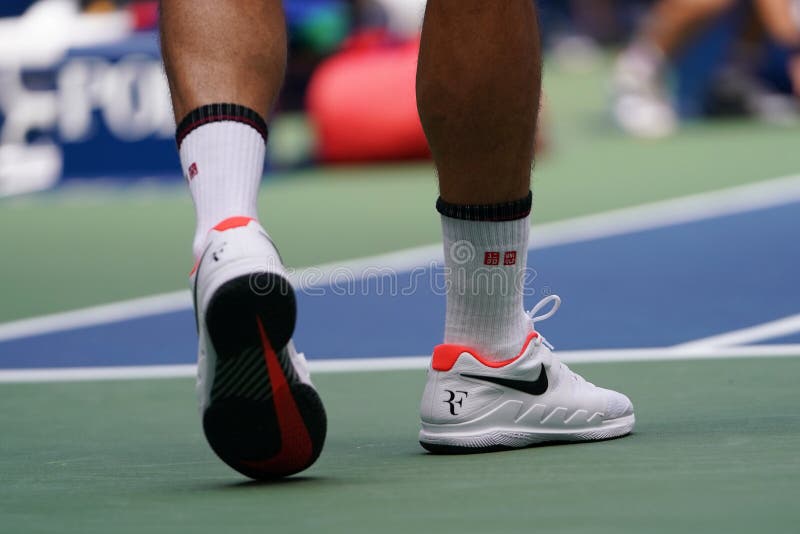 20-time Grand Slam champion Roger Federer of Switzerland wears custom Nike tennis shoes during the 2019 US Open round of 16 match